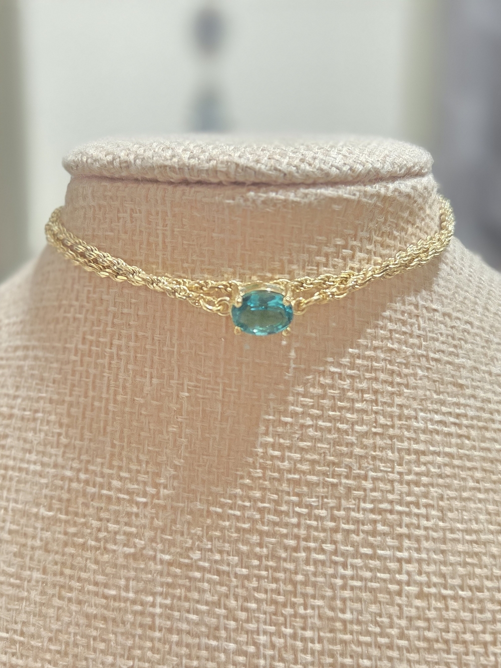 Gold Multi-Chain Bracelet with Blue Stone